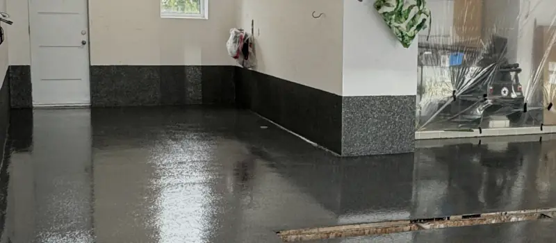 The same garage, charcoal flake epoxy floor finished