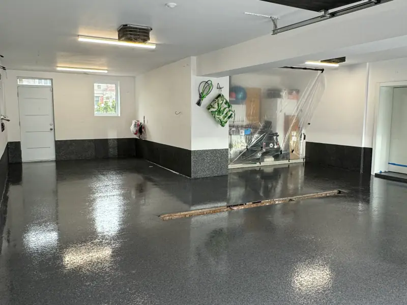 Garage floor finished in glossy charcoal flake epoxy